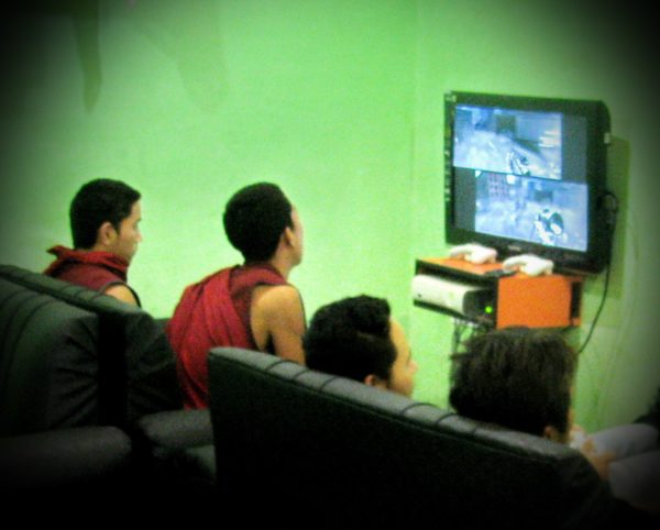 Is it just me, or is there something a bit wrong about Tibetan monks in robes playing a war video game Is it just me, or is there something a bit wrong about Tibetan monks in robes playing a war video game